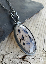 Load image into Gallery viewer, Spotty black and milky clear Montana Agate in blackened sterling silver