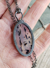 Load image into Gallery viewer, Spotty black and milky clear Montana Agate in blackened sterling silver