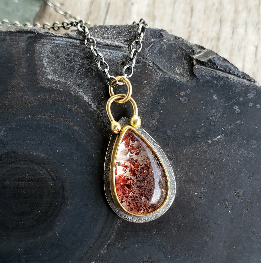 Lepidocrocite pendant in textured Sterling silver, 18 and 22 karat gold